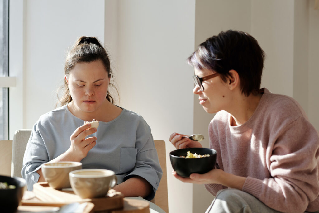 two women eating breakfast