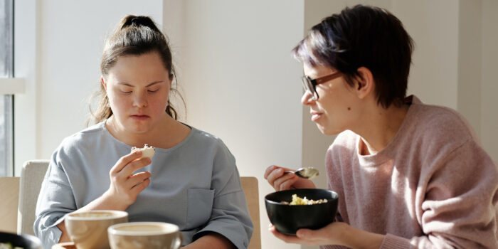 two women eating breakfast